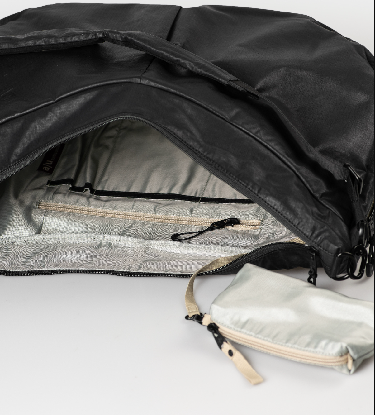 Aunts & Uncles Miyagawa RE LITE Half-moon Bag