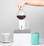 coffee being poured into the corkcicle mug